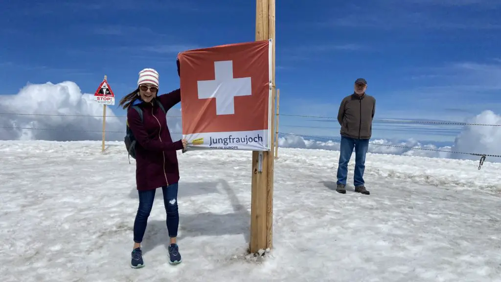 Jungfraujoch Aletsch Glacier Ice Plateau with the swiss flag Aplins in the Alps