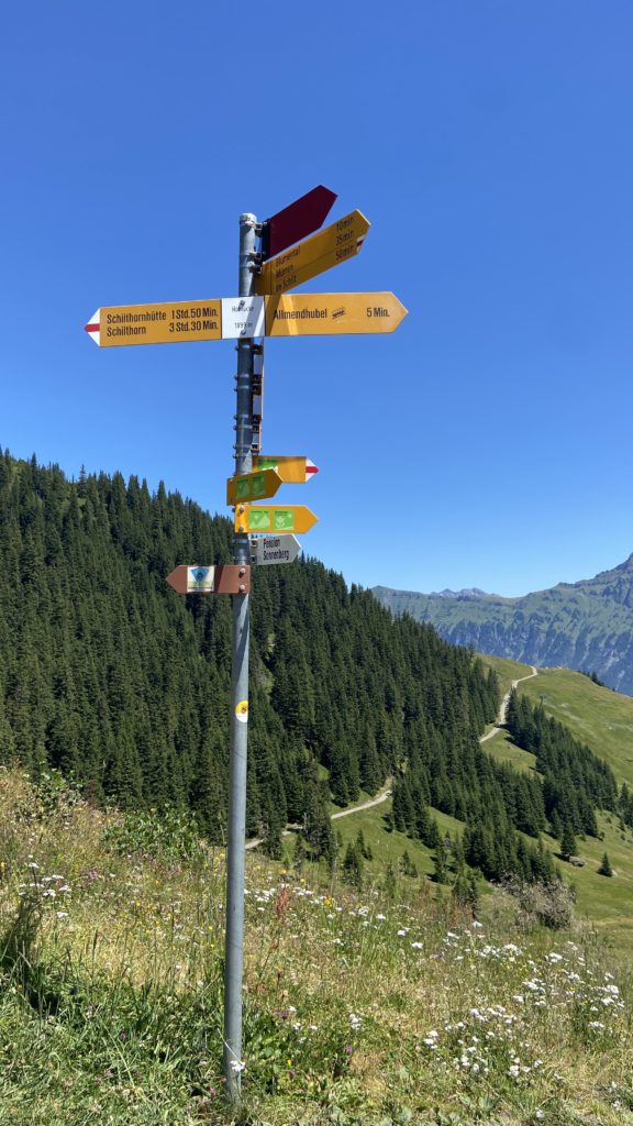 Swiss Alps trail signs for Northface Trail Murren Allmendhubel Switzerland Aplins in the Alps