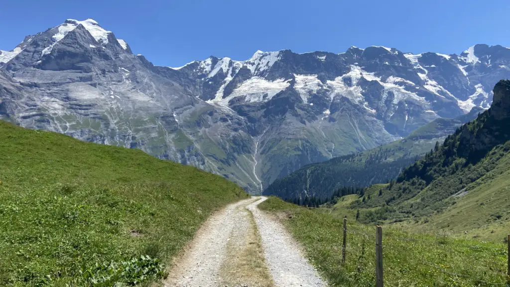 hiking in the swiss alps near murren and gimmelwald switzerland in summer