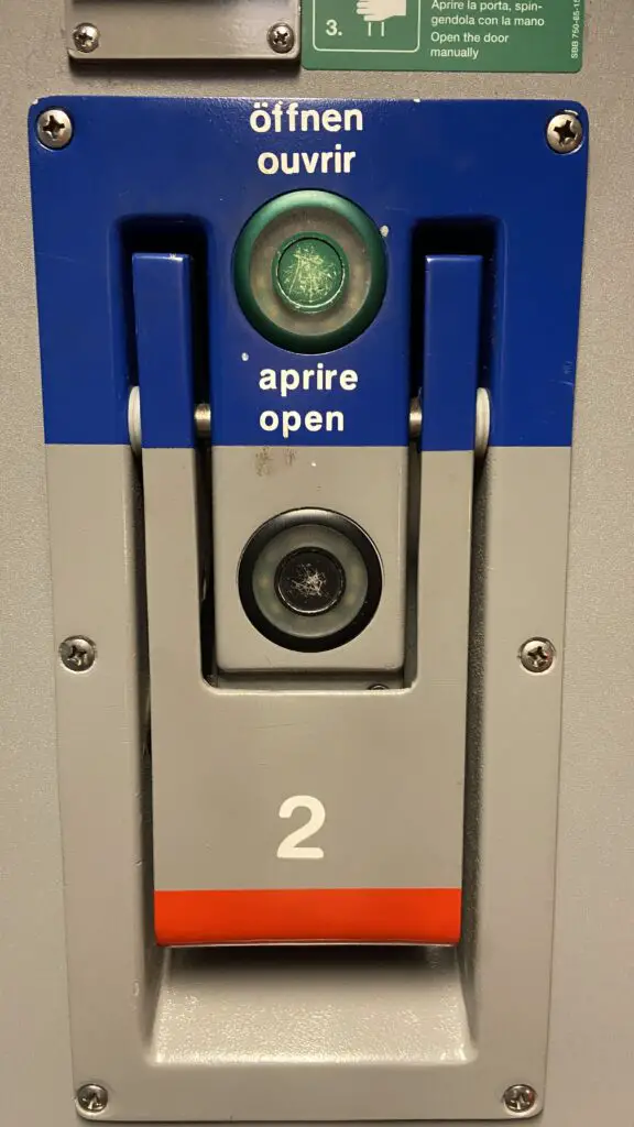 open door button on Swiss train