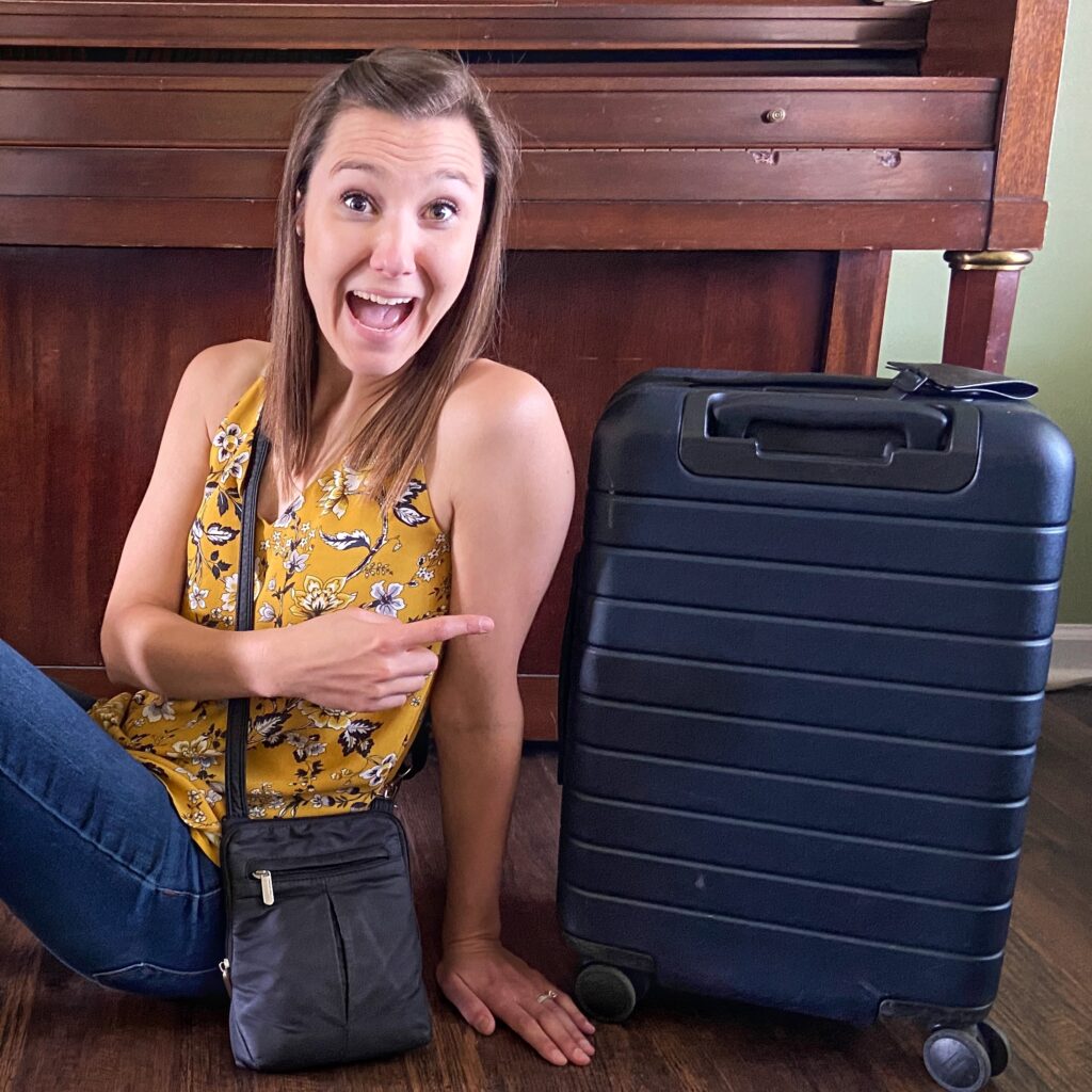 jana excited about her away carry on suitcase and travelon anti-theft locking purse