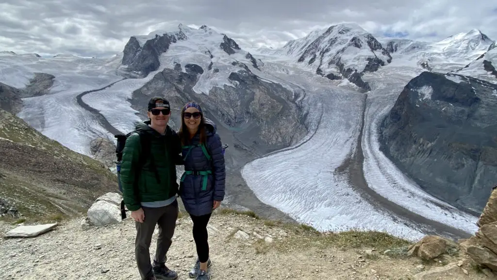 jana and brett in front of glaciers on the panoramic walk at gornergrat zermatt switzerland