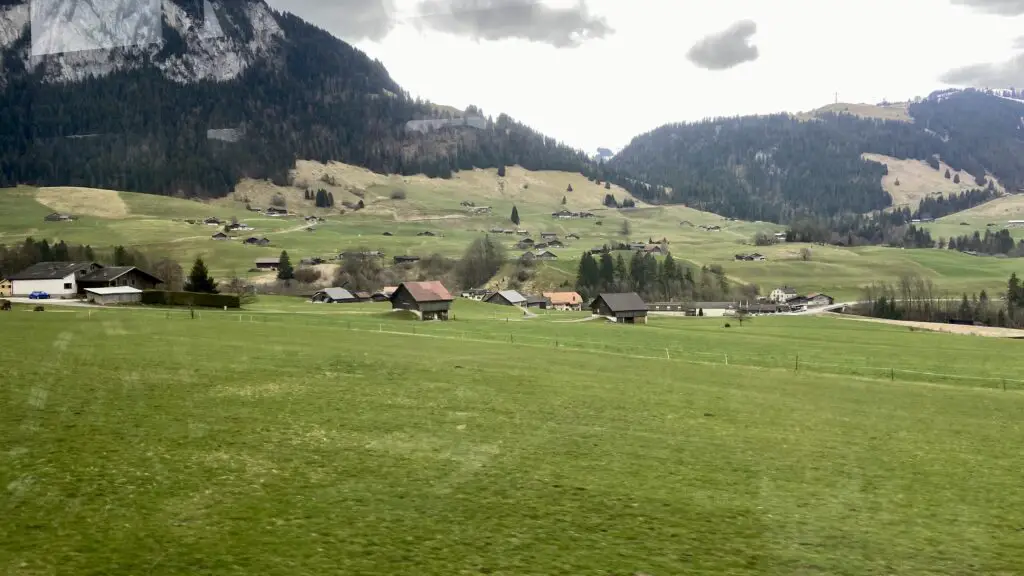 views of farms from the goldenpass express train