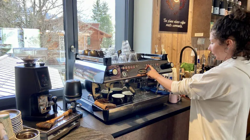 owner belinda making a coffee on her machine named betty insport coffee bar murren switzerland