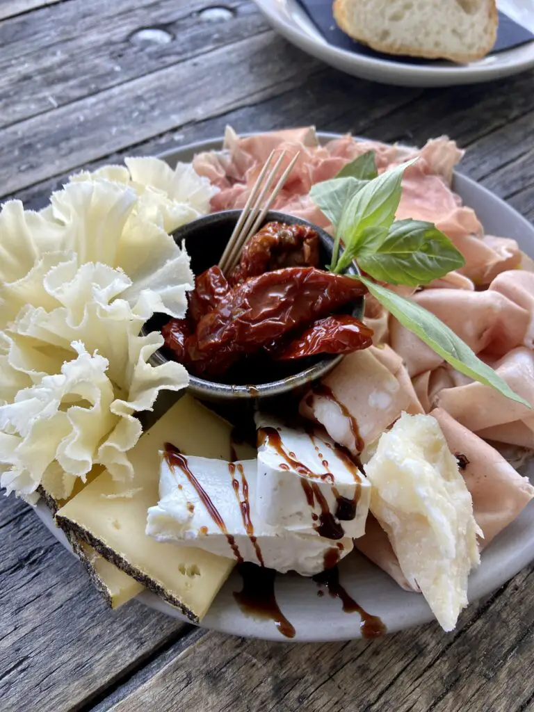 aperitivo apero at spatz interlaken switzerland meat and cheese plate