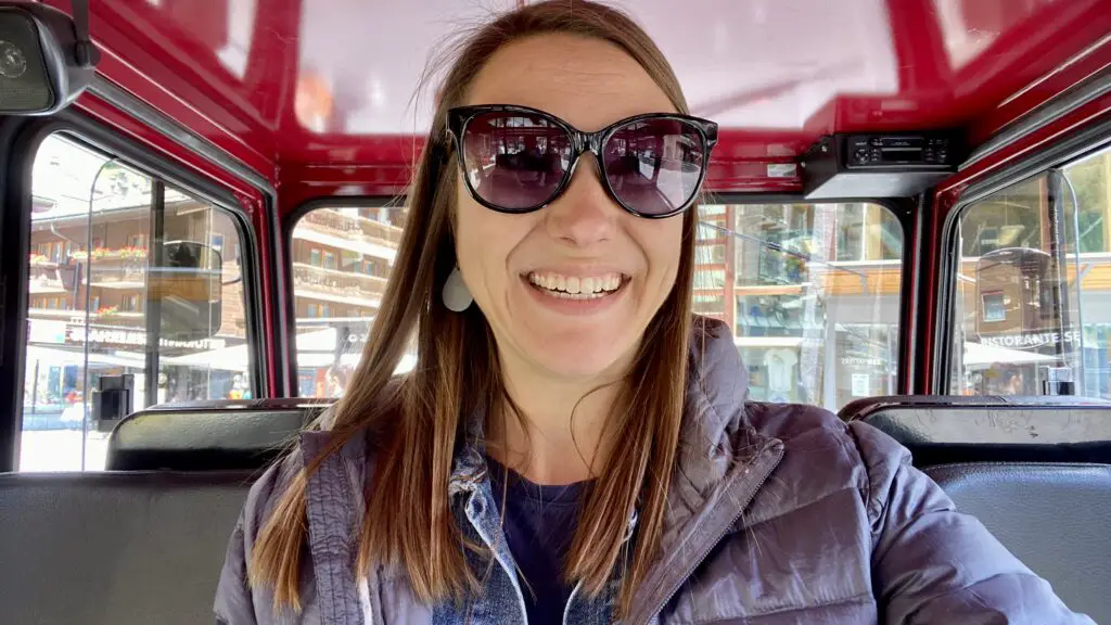 jana riding an e-bus in zermatt switzerland