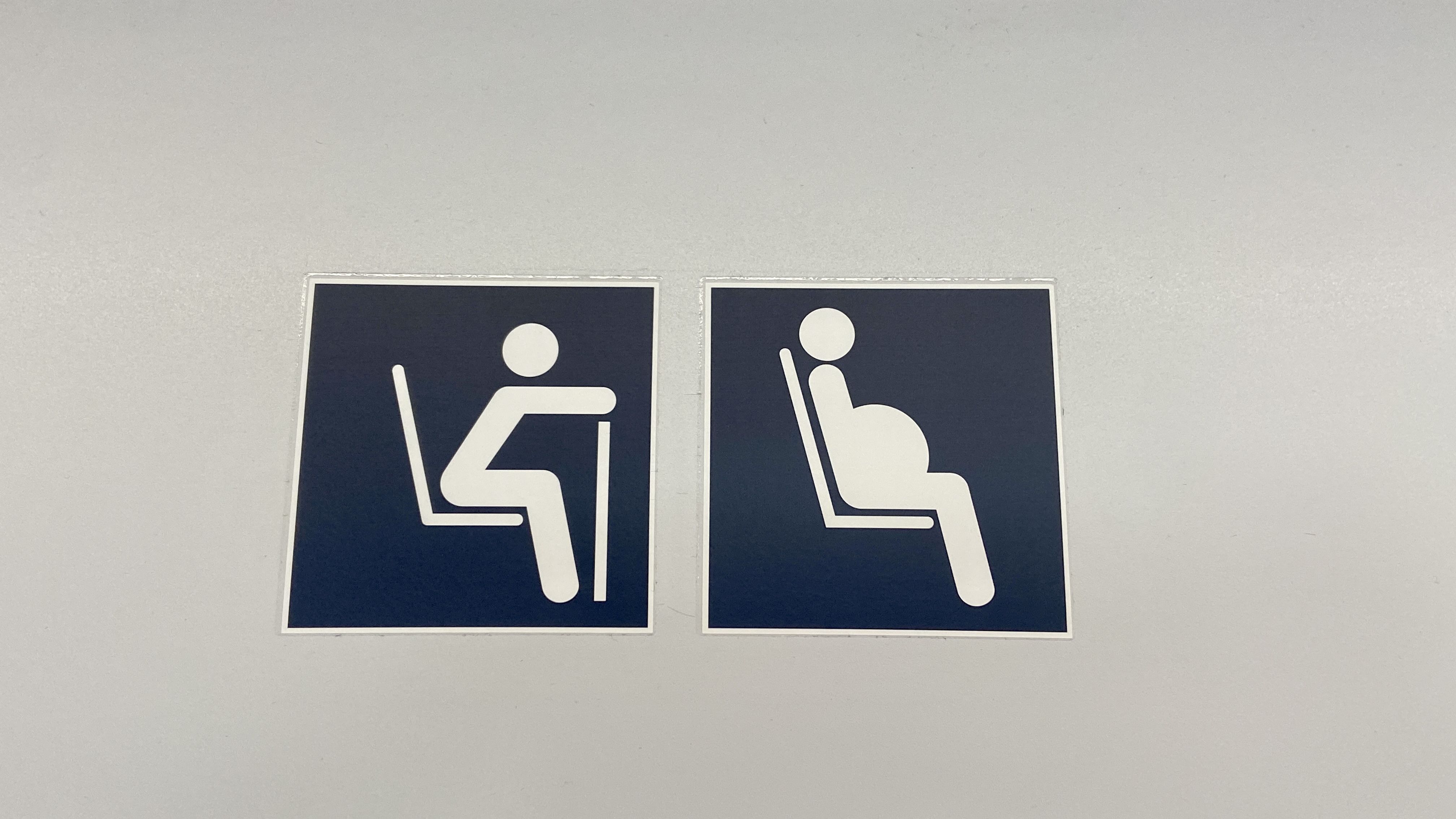 handicap sign and seats for expectant mothers