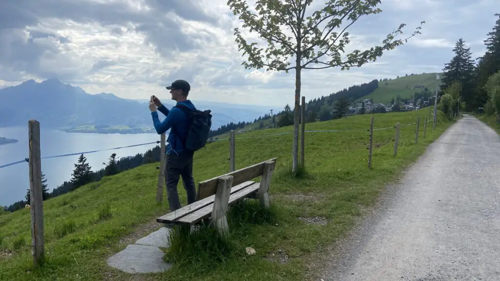 brett taking photos of lake lucerne from the rigi panorama hike