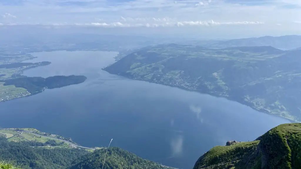 lake and green hills viewed from rigi kulm switzerland