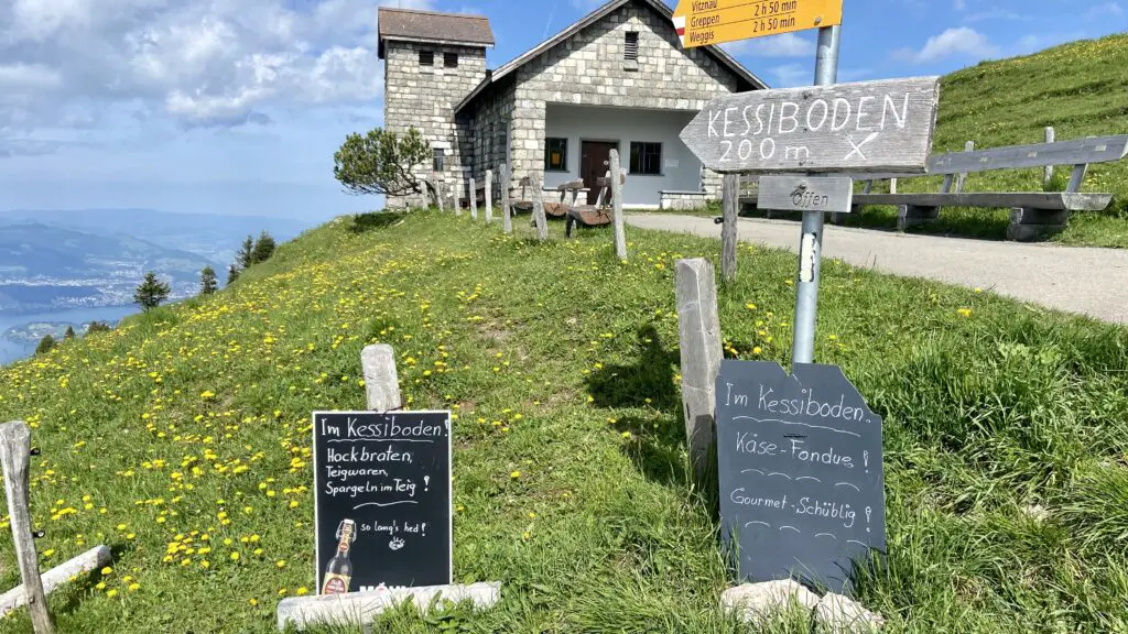 rigi chapel with trail signs for kessiboden restaurant