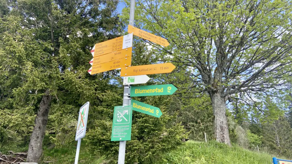 trail signs at hiking to Kaenzeli lookout near rigi kaltbad switzerland