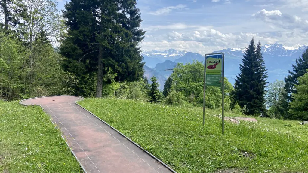 mini gold at rigi kaltbad switzerland with a view of the swiss alps