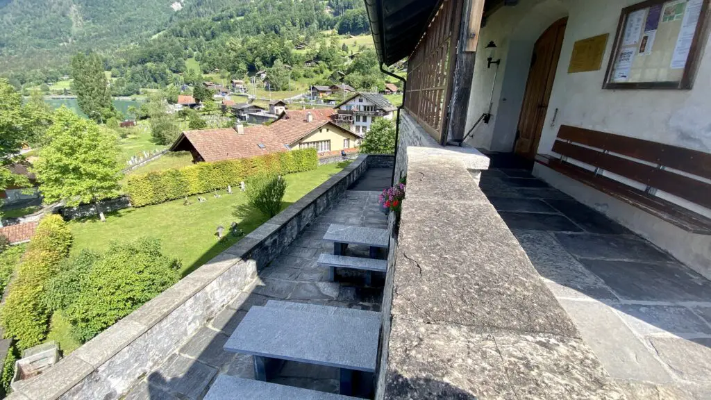 picnic tables at brienz church in brienz switzerland