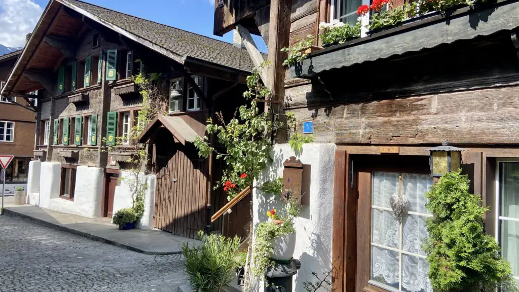 view of swiss chalets on brunngasse most beautiful street in switzerland