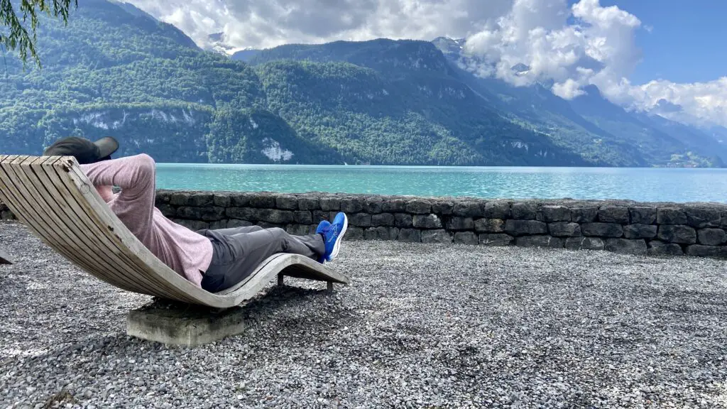 brett relaxing in a chair on lake brienz