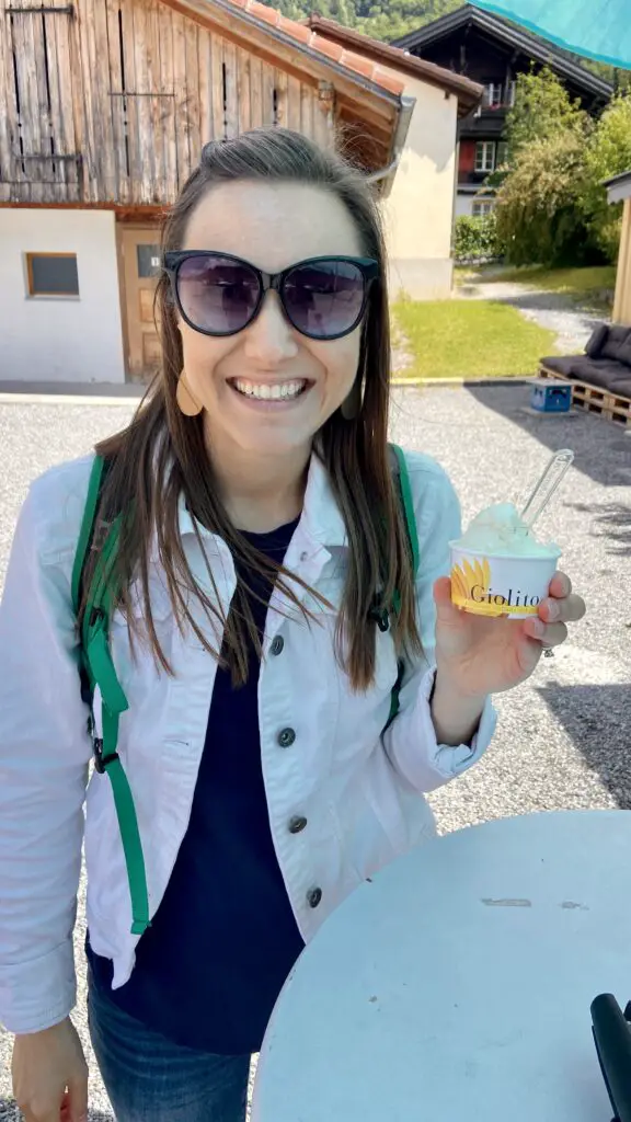 Jana eating gelato from brienz food truck in brienz switzerland