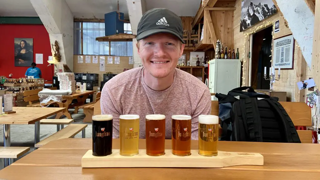 brett tasting a beer flight at jungfrau brewery brienz switzerland