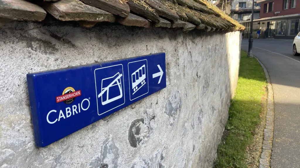 stanserhorn cabrio signs in the village of stans switzerland