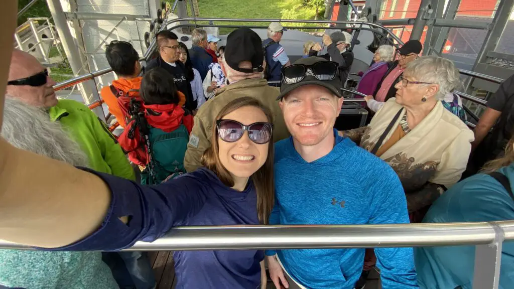 jana and brett aplins in the alps on the stanserhorn cabrio cable car