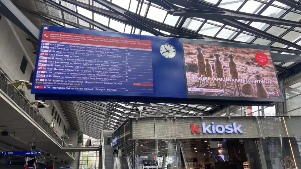 lucerne switzerland train station and time table board