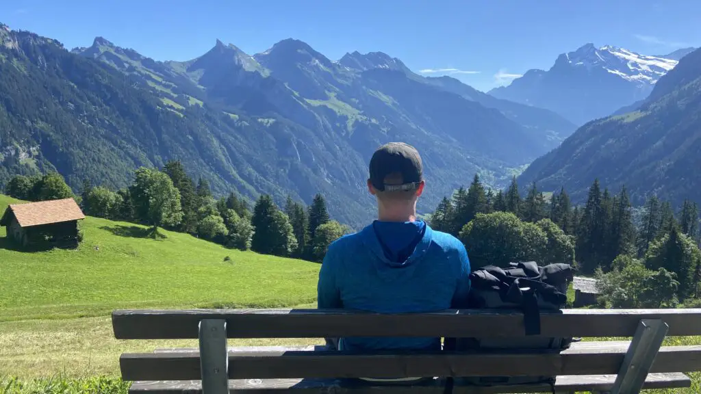 brett from aplins in the alps admiring the view from sulwald switzerland of schynige platte