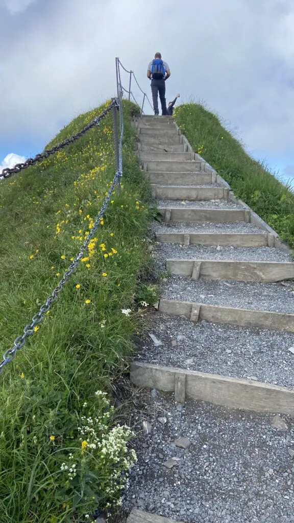 climbing steps on the stoos ridge hike most beautiful hike in switzerland