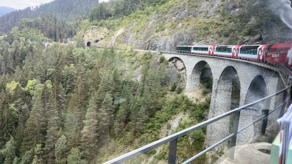 view of the glacier express train on a bridge