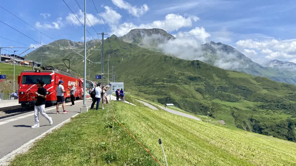 stopping at oberalp pass on the glacier express train ride