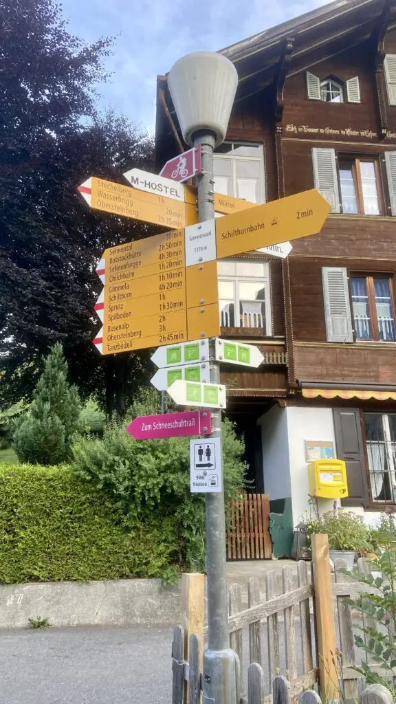 obersteinberg trail signs in the village of gimmelwald switzerland