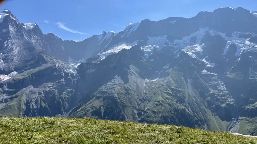 panoramic view of swiss alps mountain peaks and glaciers from tanzbödeli