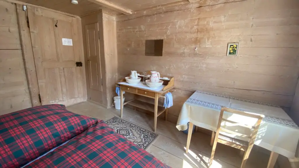 room at hotel obersteinberg switzerland with vanity mirror and desk