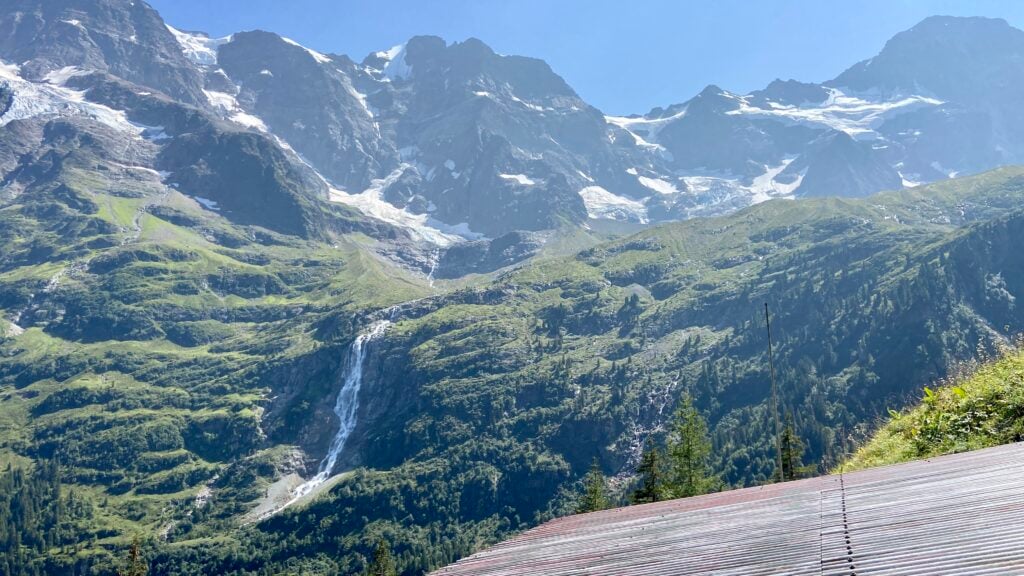 waterfall and mountain views from our room at hotel obersteinberg switzerland