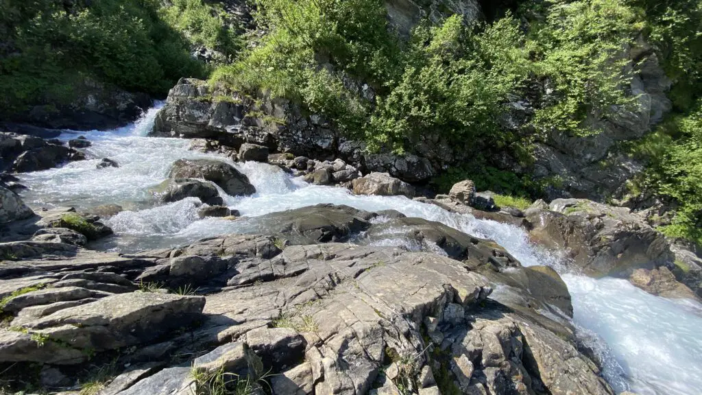 white water at stäubi waterfall at trübsee