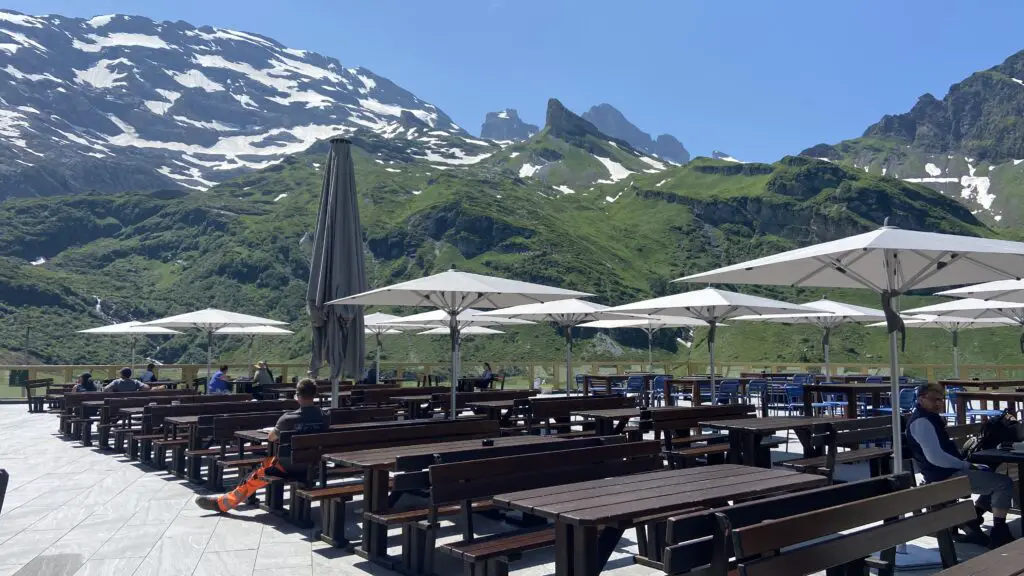 trübsee lodge restaurant dining terrace tables with umbrellas