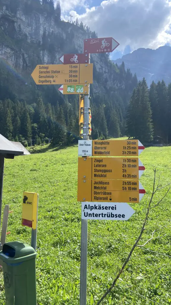 hiking from untertrübsee to gerschnialp trail signs