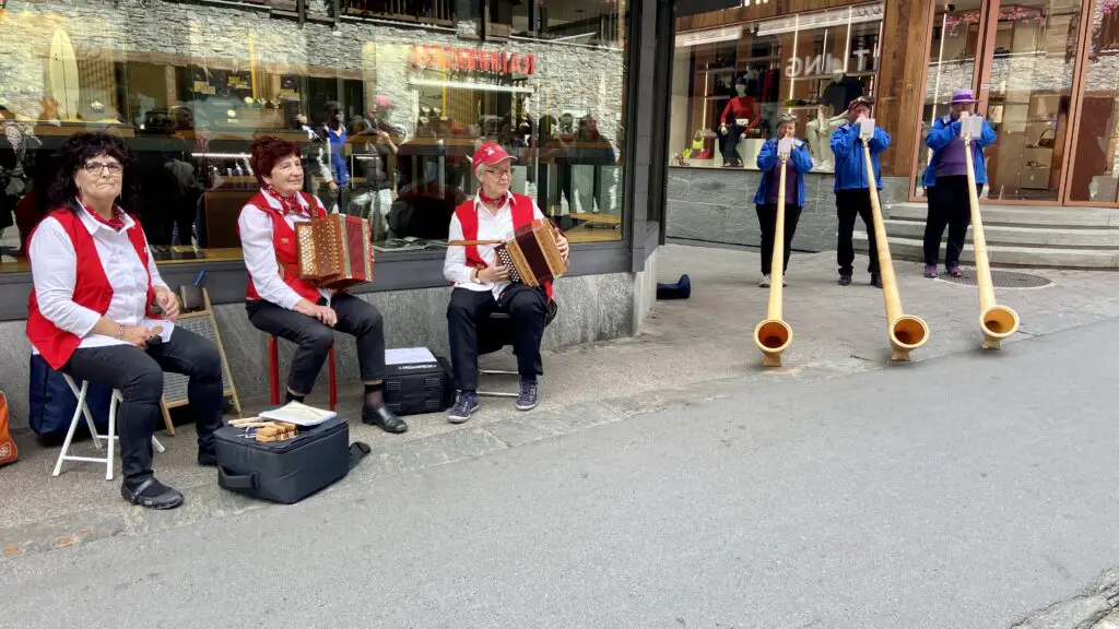 live swiss music in zermatt switzerland yodeling alphorns and traditional swiss clothes