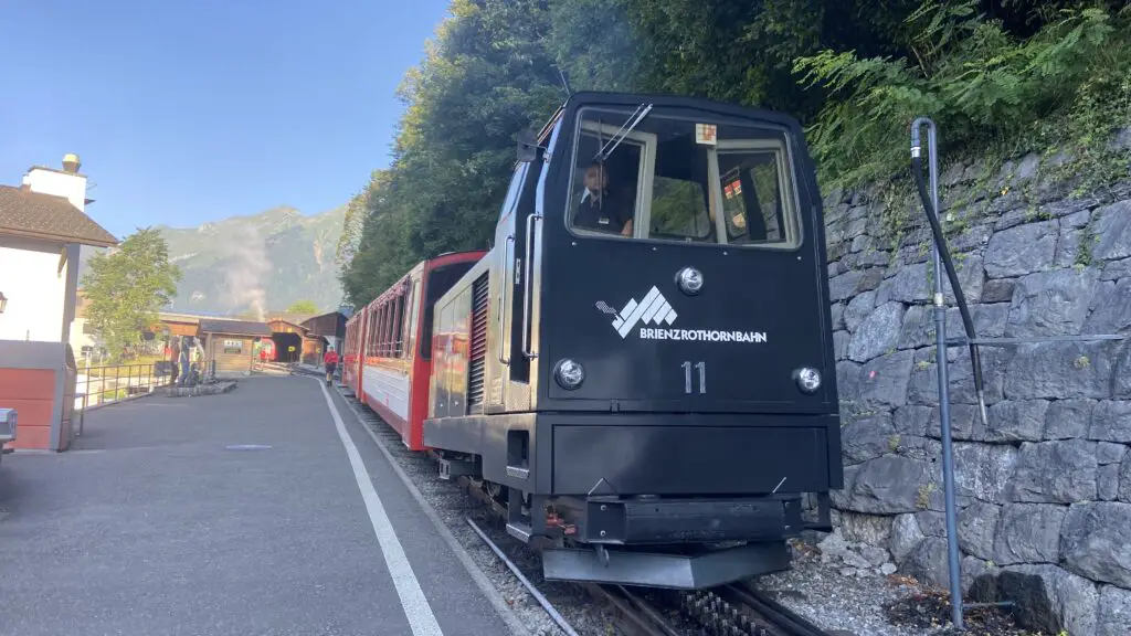 historic black steam train at brienz rothorn station in brienz switzerland