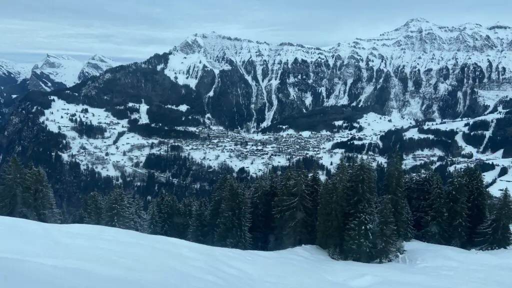 snowy view of wengen from grutschalp