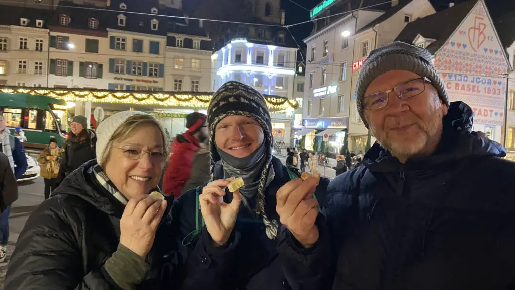 aplins in the alps eating swiss christmas cookies at swiss christmas market