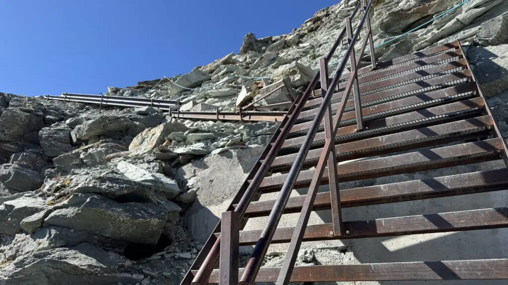 metal staircases leading to the hornli hut hiking in zermatt switzerland