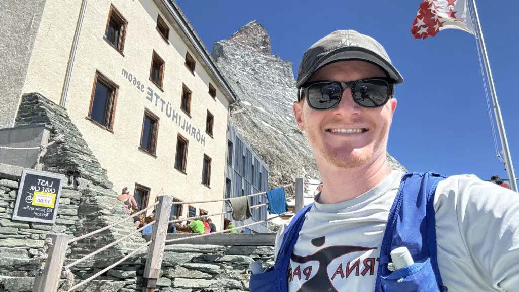 Brett at the hornli hut with the matterhorn in the background