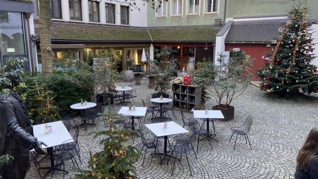 basel switzerland magical courtyards for christmas outdoor seating with christmas trees and lights
