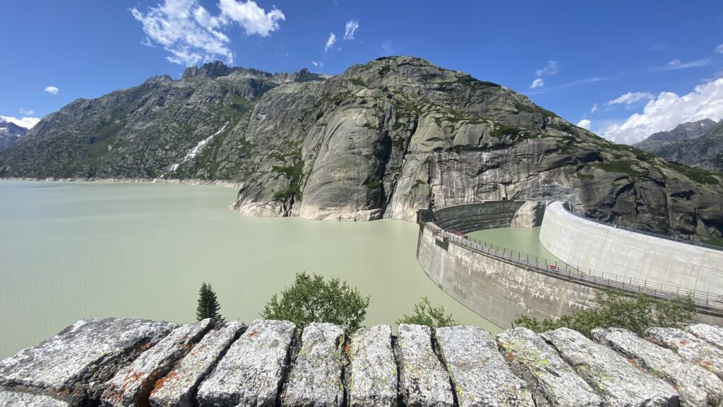 grimsel pass glacial lake and dam in switzerland