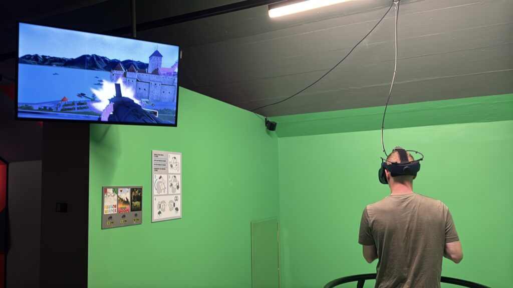 brett from aplins in the alps playing a virtual reality game at fort du chillon