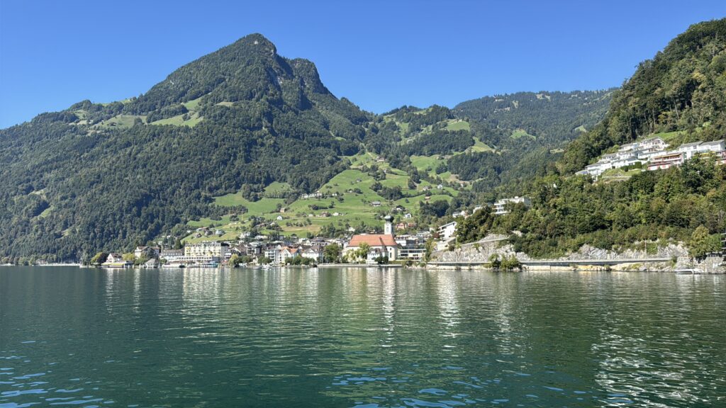view of vitznau from a boat on lake lucerne