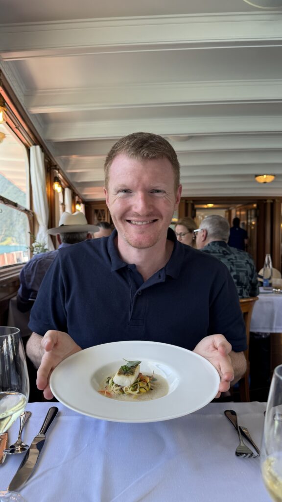 brett eating a 5 course meal on legends of lake lucerne cruise