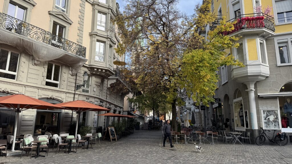 niederdorf zurich square with restaurants and trees